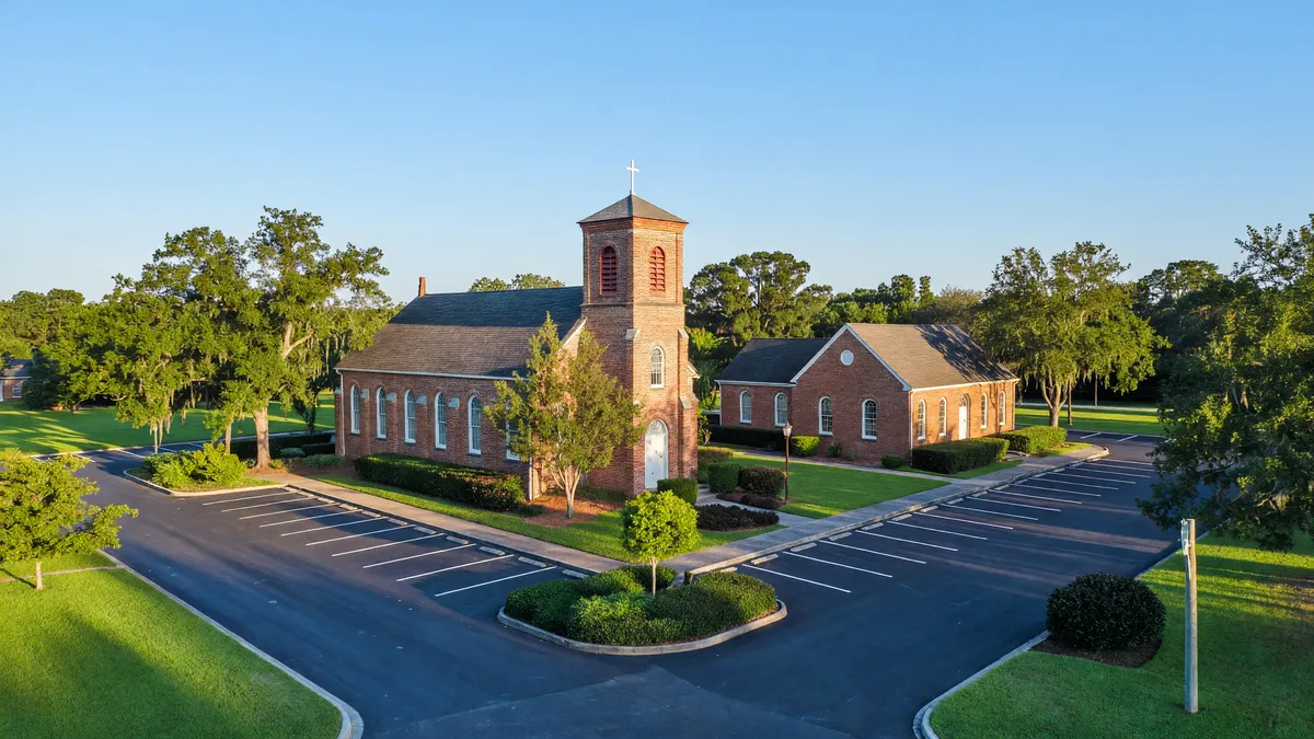 Historic Riverside Property with Versatile Potential